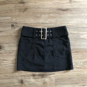 Tracy Evans black grommet belt mini skirt